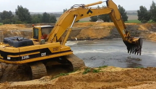 Рытье водоемов в Партизанске - цена от 914 руб. | 2Землекопа-Прт 